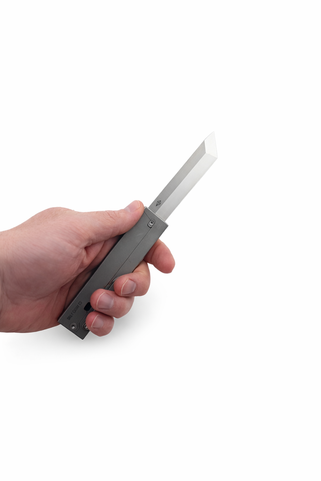 Parachute Pro titanium gravity knife in hand showing grip ergonomics
